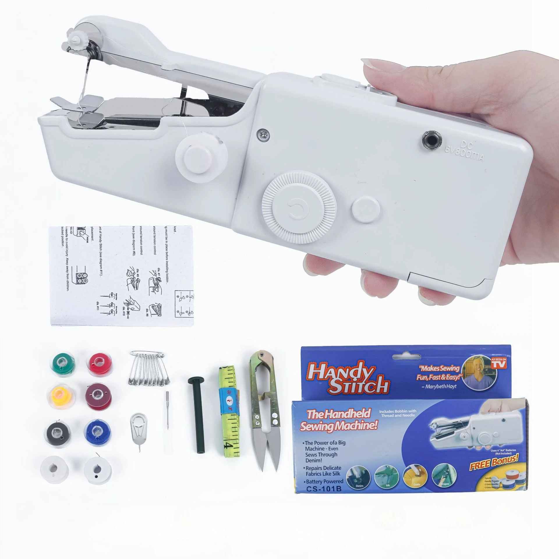 Handheld sewing machine with accessories and packaging on a white background
